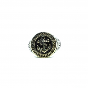 Anello color oro e nero con ancora in rilievo